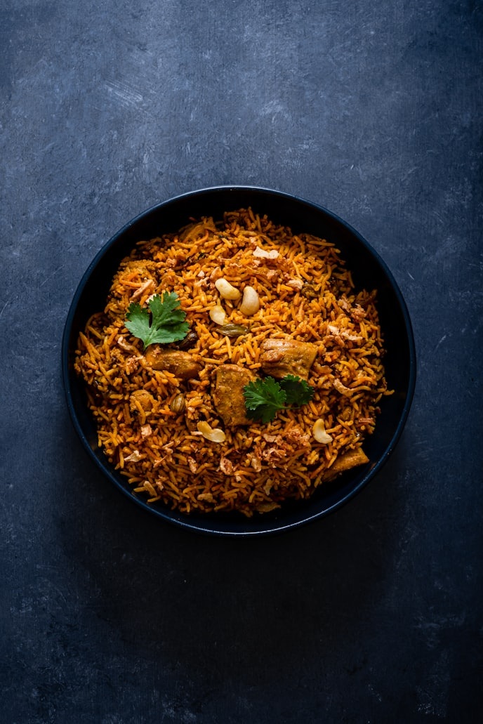 Biryani rice with meat and cilantro